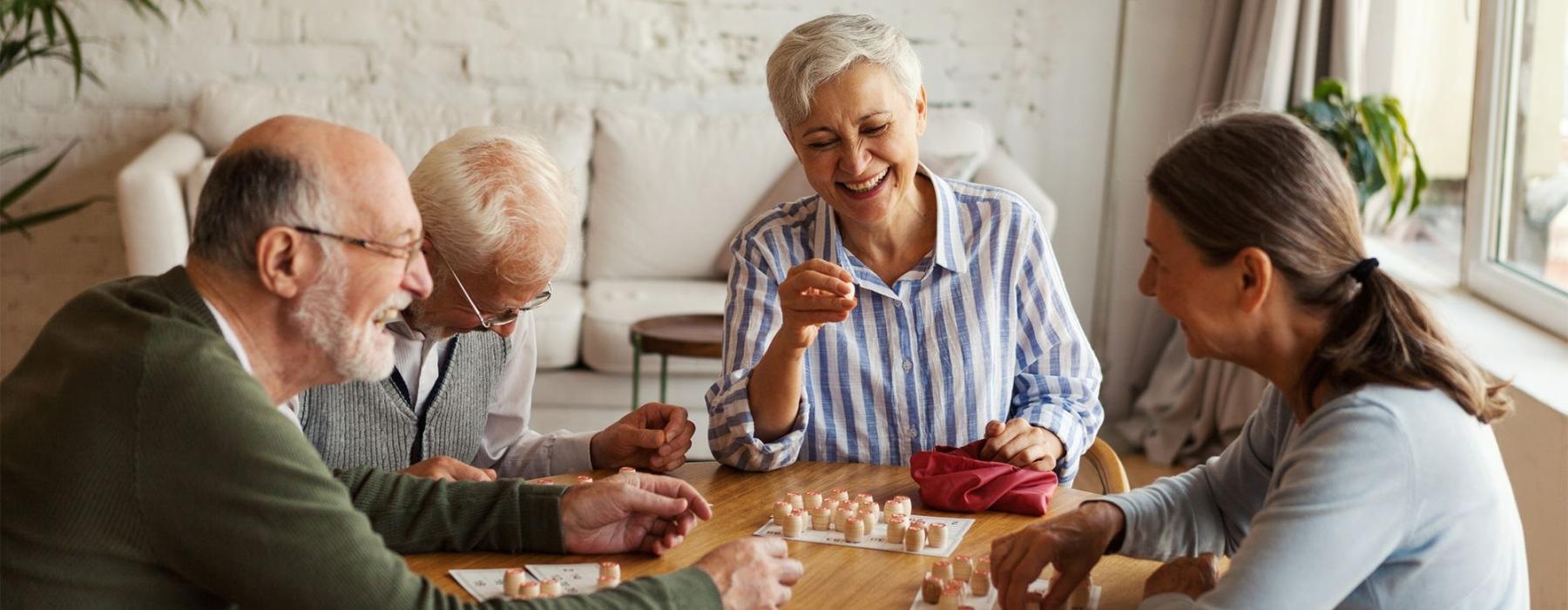 a group of people sitting around a table