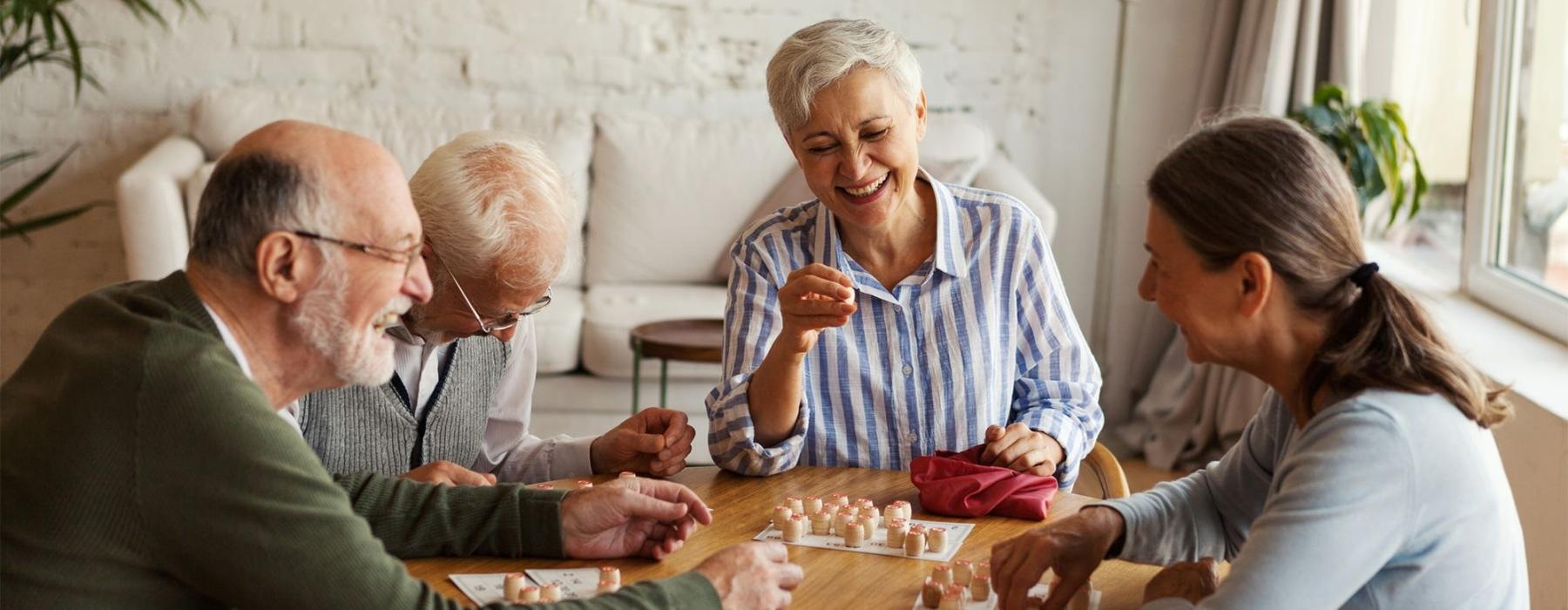 a group of people sitting around a table